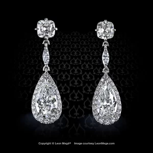 Convertible earrings with antique cut pear diamonds by Leon Mege.
