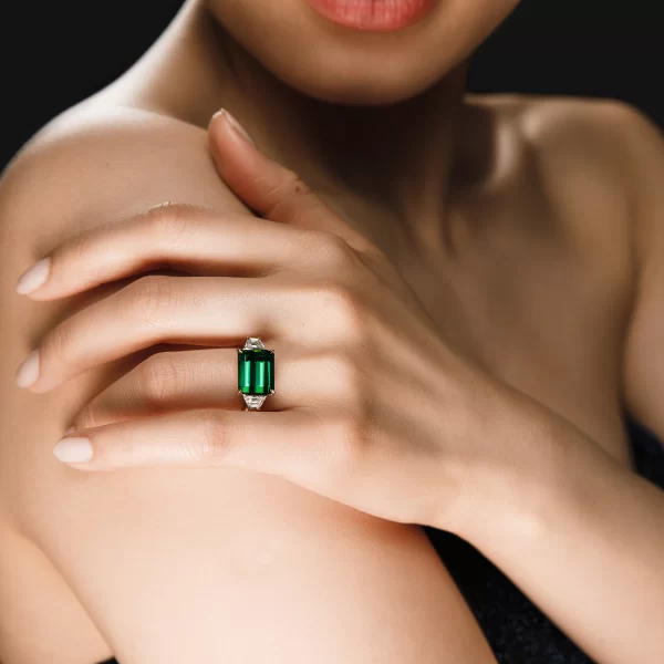 Leon Megé East-West three-stone ring with emerald cut chrome tourmaline and diamond trapezoids r7200