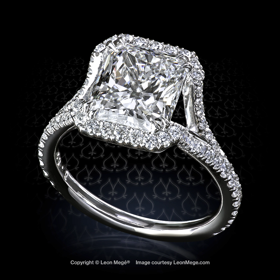 Split shank halo ring featuring a radiant cut diamond with micro pave by Leon Mege.