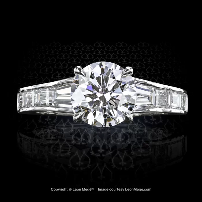 Leon Megé bespoke solitaire with a round diamond in claw prongs and channel-set baguettes r7087