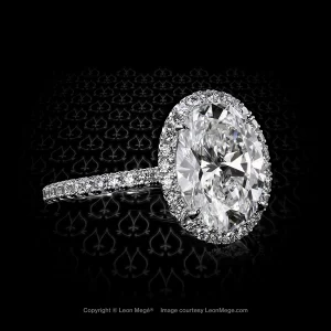 811 halo ring featuring an oval diamond by Leon Mege.