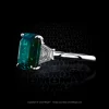 Leon Megé precision-forged three stone ring with a Colombian emerald set between diamond traps r7245