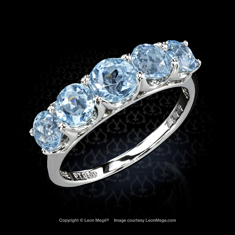 Five stone aquamarine Old European cut heat wave wedding ring in platinum by Leon Mege