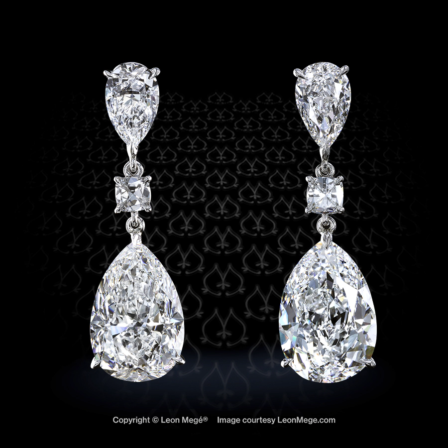 Custom made drop earrings, featuring pear diamonds by Leon Mege