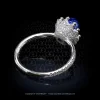 Leon Megé Award-winning Bellflower™ right-hand ring featuring a blue sapphire cab in a micro pave setting r7201
