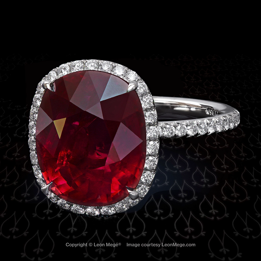 Micro pave halo ring, set with 7.02 carat natural unheated certified Burma cushion ruby by Leon Mege