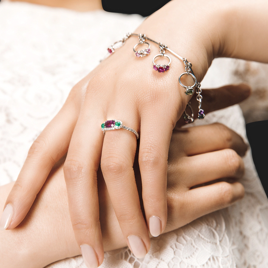 Platinum “La Petite” bracelet with 9 miniature ring charms set with natural gemstones by Leon Mege b7482