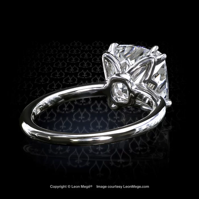 Leon Megé elegant engagement solitaire with a modern cushion diamond in double claw prongs r7397