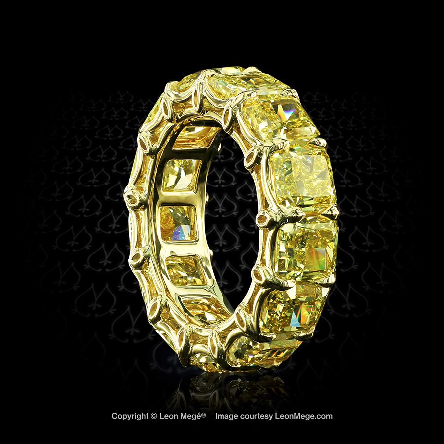 Eternity band featuring large fancy yellow radiant cut diamonds in 18K yellow gold by Leon Megé r7422