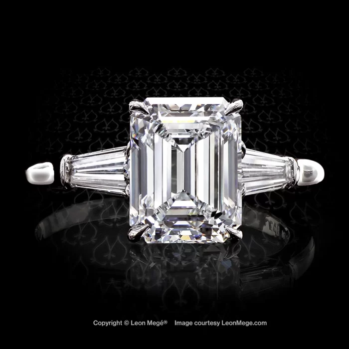 Leon Megé three-stone engagement ring with an emerald cut diamond and tapered baguettes r6709