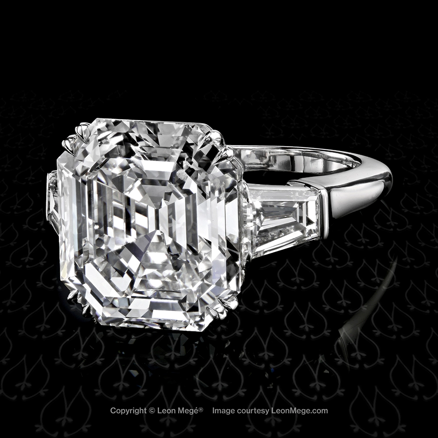 Classic three-stone ring featuring a True Antique Asscher cut diamond by Leon Mege.