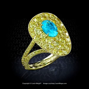 Brazilian Paraiba tourmaline with fancy yellow diamonds in a right-hand ring by Leon Mege