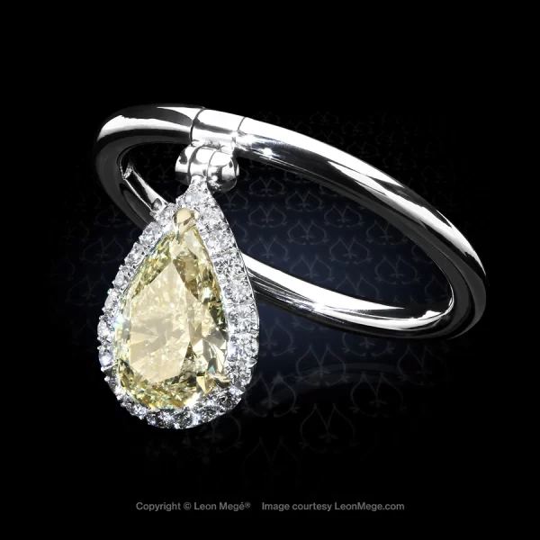 Leon Megé DeBreloque reversible ring with a fancy yellow diamond in a pivoting micro pave halo r7663