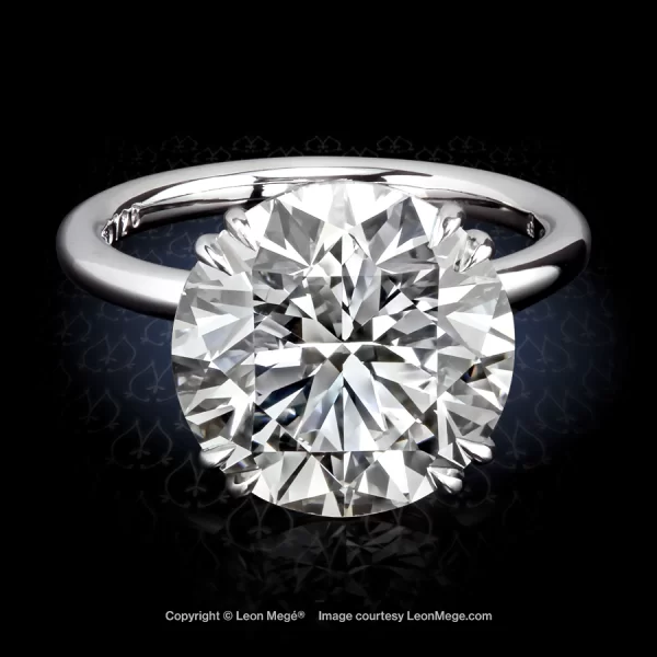 Leon Megé bespoke solitaire featuring a breathtaking round diamond in double-claw prongs r5726