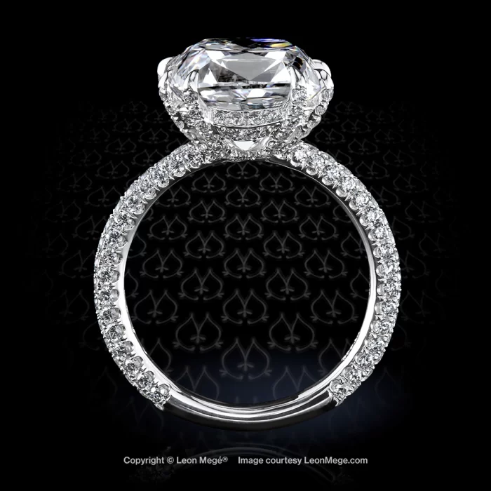 True antique cushion diamond ring set in a custom made platinum solitaire with micro pave by Leon Mege