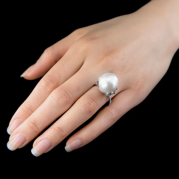 Leon Megé bespoke right-hand ring with a South Sea pearl on a bed of white diamonds r7649