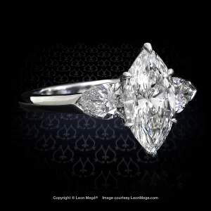 Classic three-stone ring featuring marquise diamond with pear shape diamonds by Leon Mege r1191