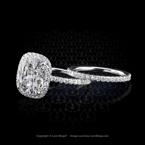 Micro pave halo diamond engagement ring in platinum by New York designer Leon Mege
