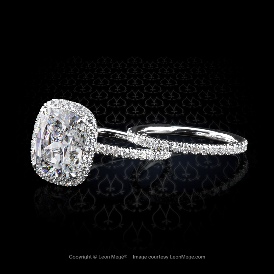 Micro pave halo diamond engagement ring in platinum by New York designer Leon Mege