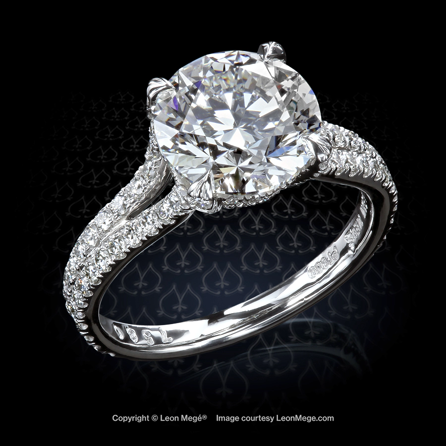 Split shank diamond ring with micro pave in platinum by famous couture designer Leon Mege
