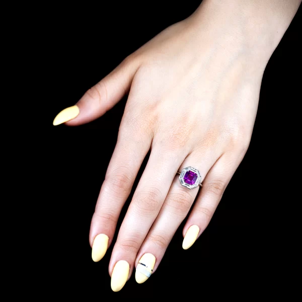 Leon Megé Haute Couture ring with a vivid-pink Asscher-cut sapphire and diamond calibre r7626