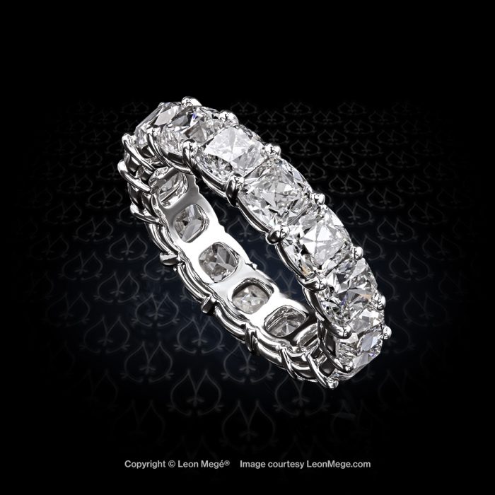 Shared prong band with True Antique cushion diamonds handmade in platinum by Leon Mege.