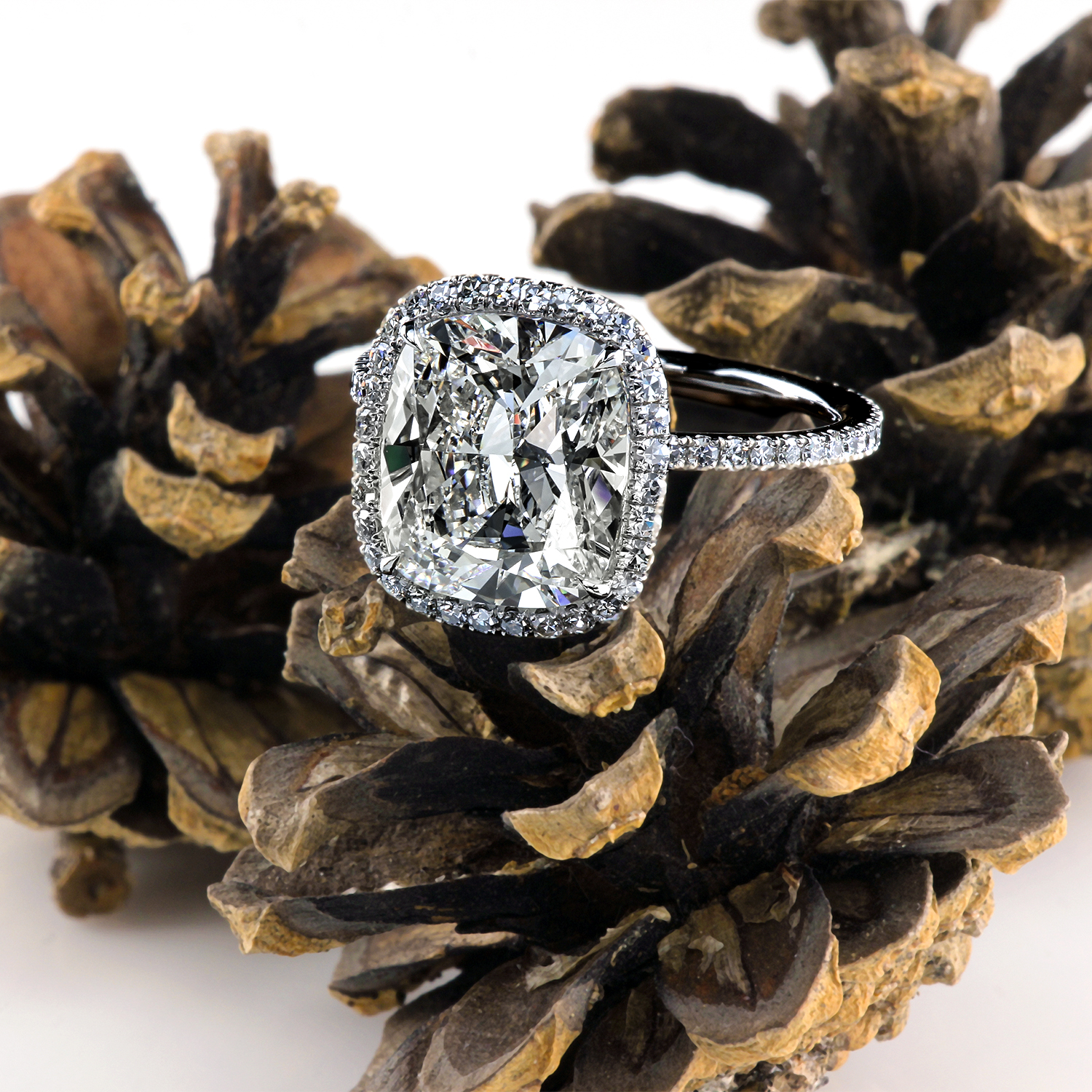 Leon Megé bespoke 811™ engagement ring with a modern cushion diamond surrounded by a micro pave halo in a precision-forged platinum mounting r7688