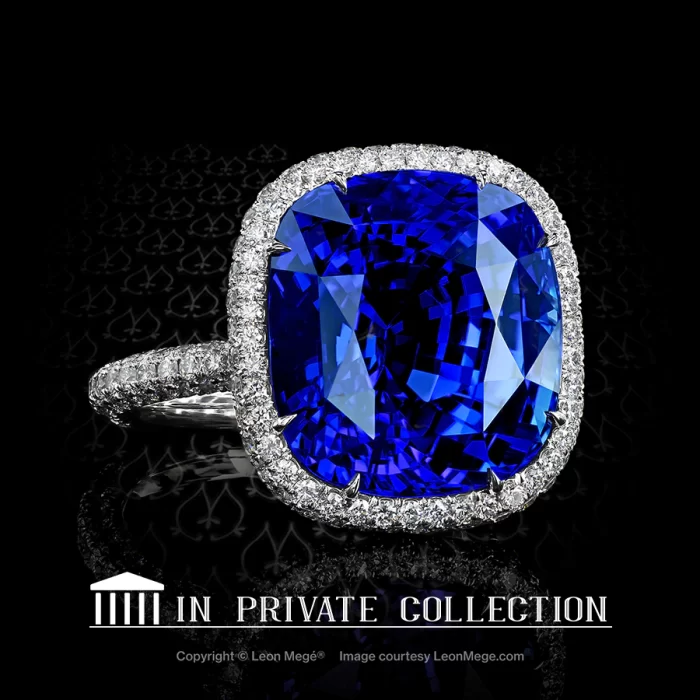Custom micro pave halo ring with blue Burma cushion sapphire by Maestro Leon Mege