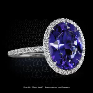 Leon Megé bespoke 811™ right-hand statement ring featuring oval tanzanite surrounded by a halo of diamond micro pave r7403