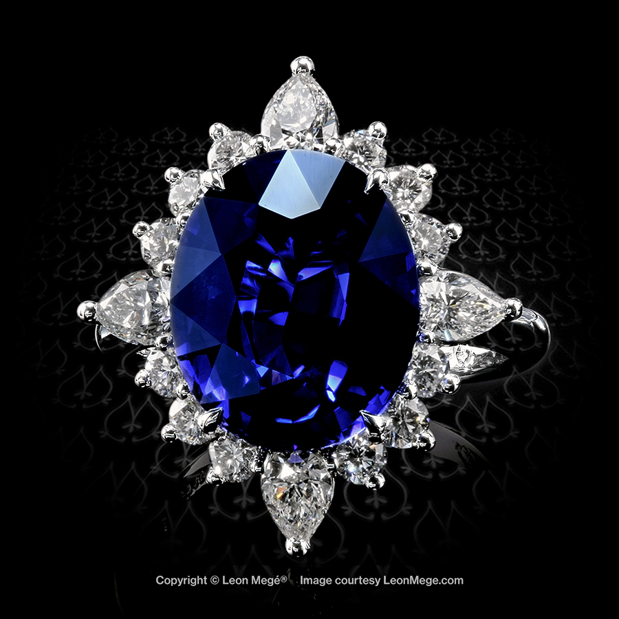 Custom made "Rose of the Winds" cluster ring with 7.02 carat oval blue sapphire by Leon Mege.