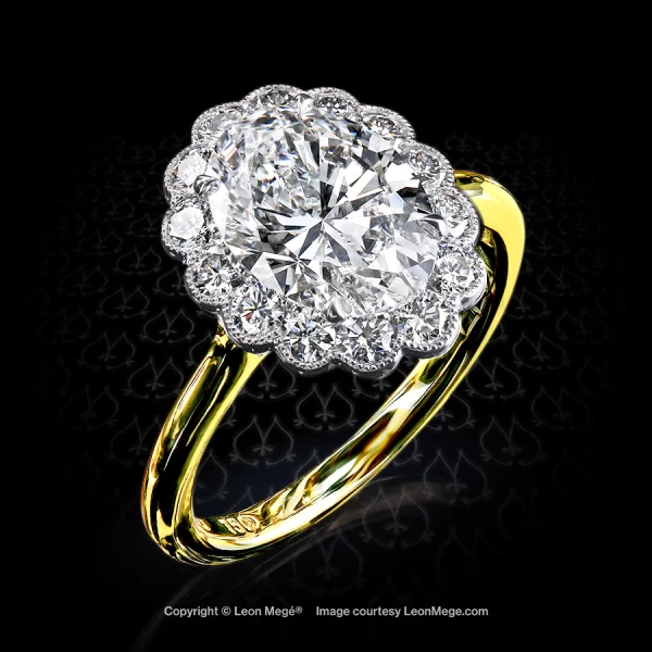 Leon Megé two-tone ring with an oval diamond and round diamonds in a semi-bezel cluster r7737