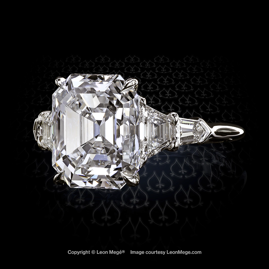 Classic five-stone ring featuring a seven carat krupp cut diamond in a five stone ring by Leon Mege.