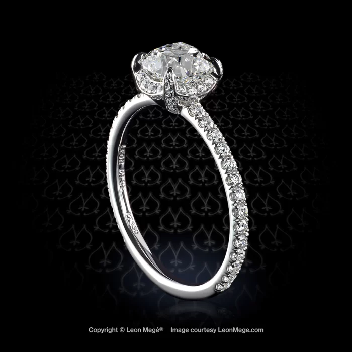 Cosmo solitaire featuring a cushion diamond by Leon Mege.