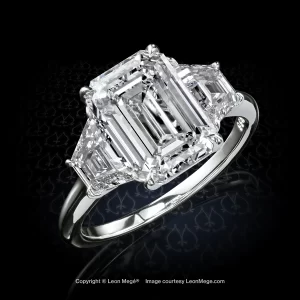 Leon Megé classic three-stone ring with an emerald cut diamond adjoined by diamond trapezoids r7666