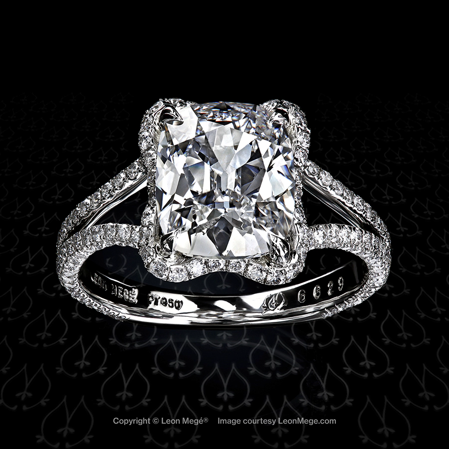 Gina custom cushion diamond engagement ring with split shank and micro pave by Leon Mege.