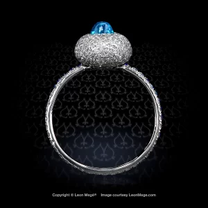Leon Megé Brazilian Paraiba cab in a right-hand ring with sapphires on a micro pave shank r7777