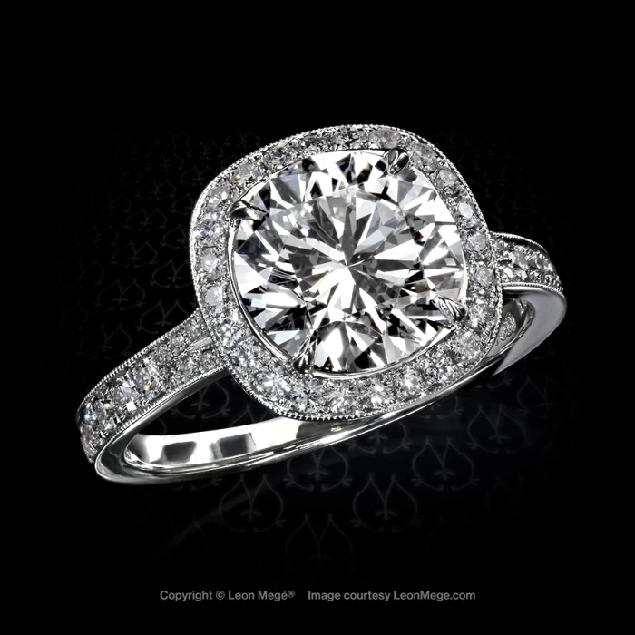 Cold Fusion diamond engagement ring with a cushion halo and ideal cut round diamond by Leon Mege
