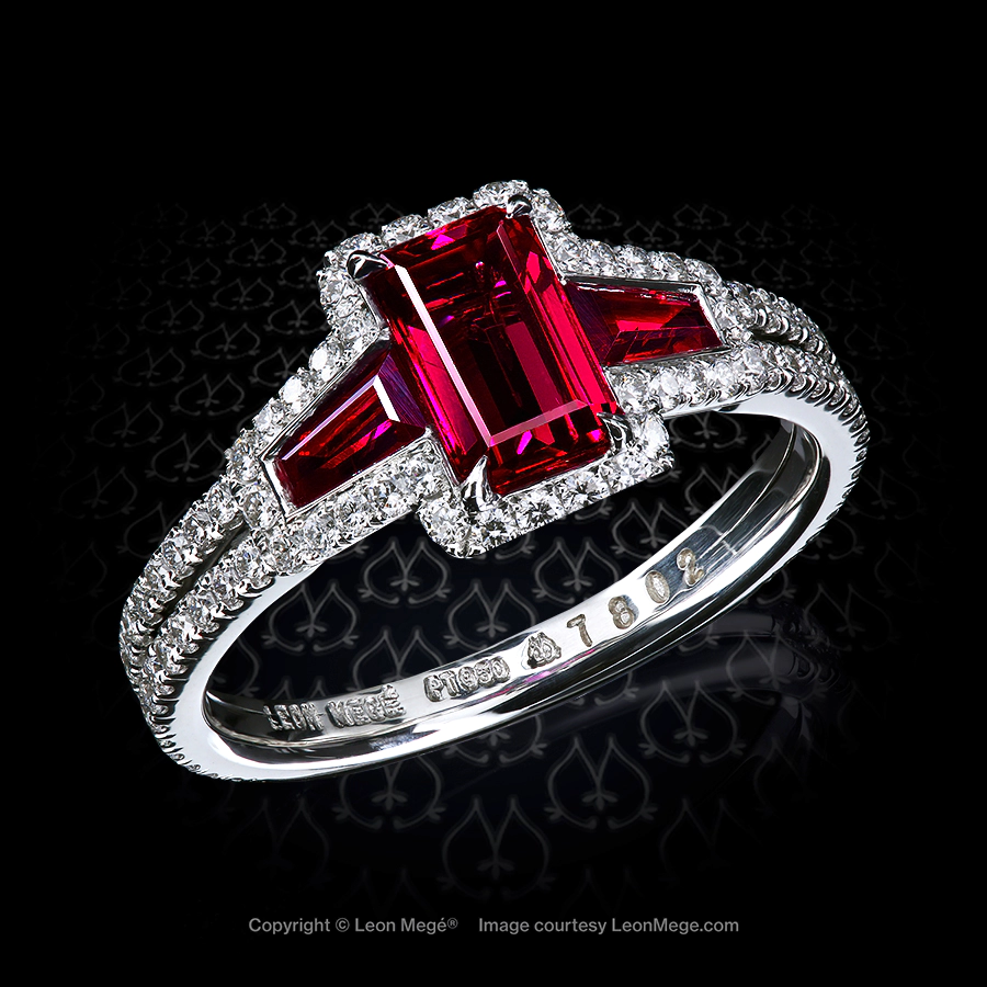 Montpassier™ three-stone ring, featuring 1.06 carat emerald cut gem ruby with natural rubies side stones and diamond micro pave by Leon Mege