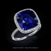 14 carat cushion blue sapphire in a platinum bespoke 821™ halo ring by Leon Mege