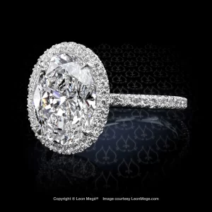 Leon Mege custom-made 811™ engagement ring with an oval diamond in a micro pave halo r7584