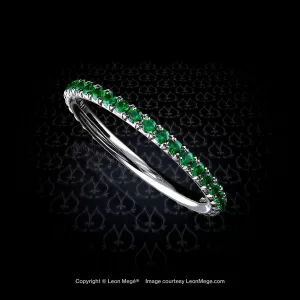 Thin eternity wedding stackable micro pave band in platinum with natural vivid green tsavorite garnets handmade by Leon Mege