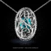 Custom made halo pendant, featuring certified 4.95 carat cushion blue Paraiba tourmaline by Leon Mege