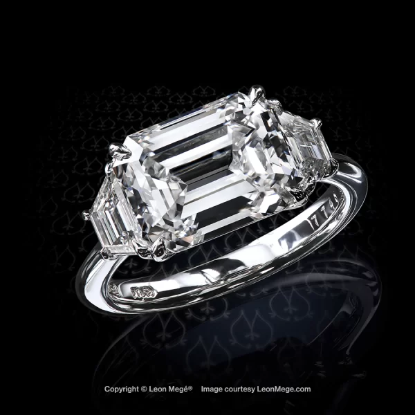 Leon Megé bespoke East-West three-stone ring with emerald cut diamond and trapezoids in platinum r7748
