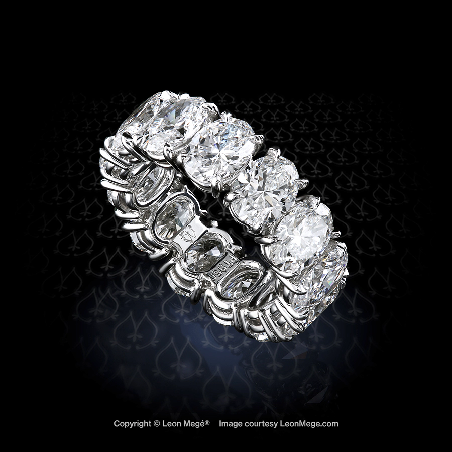 Eternity band with GIA-certified oval diamonds each set with 4 eagle claw prongs