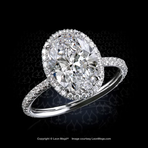 Leon Megé bespoke 811™ engagement ring with a gorgeous oval diamond in a micro pave halo r7940