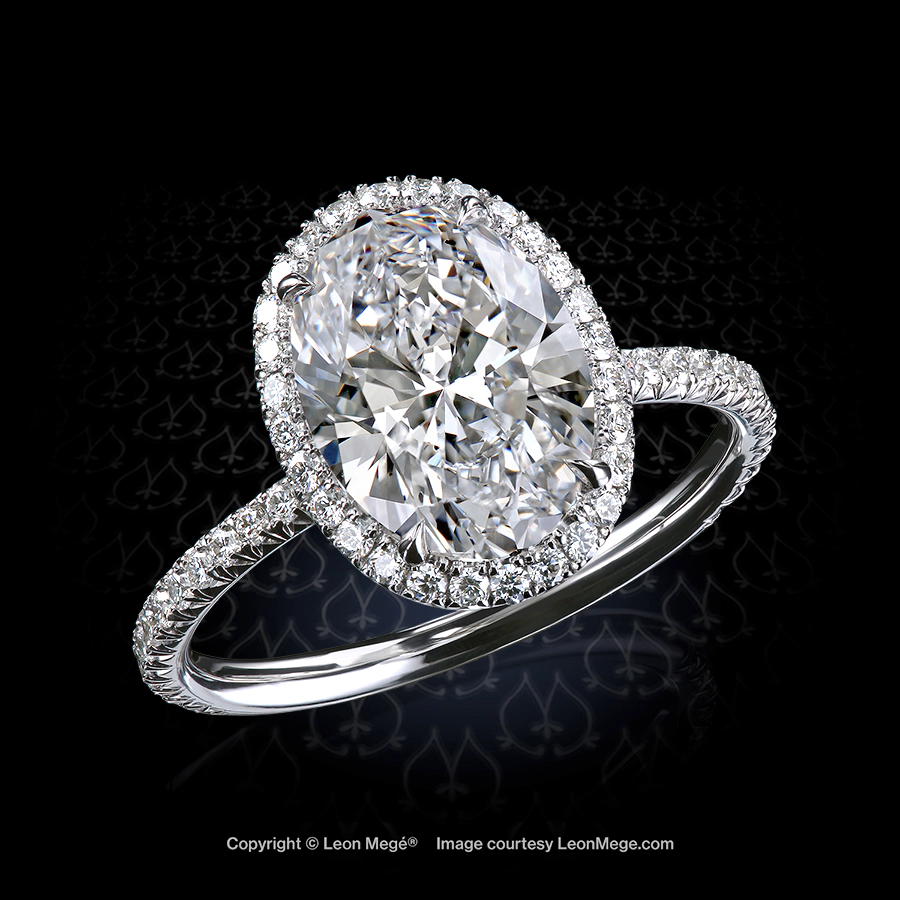 Micro pave oval diamond halo ring in platinum by Leon Mege with 2.81 carat natural diamond