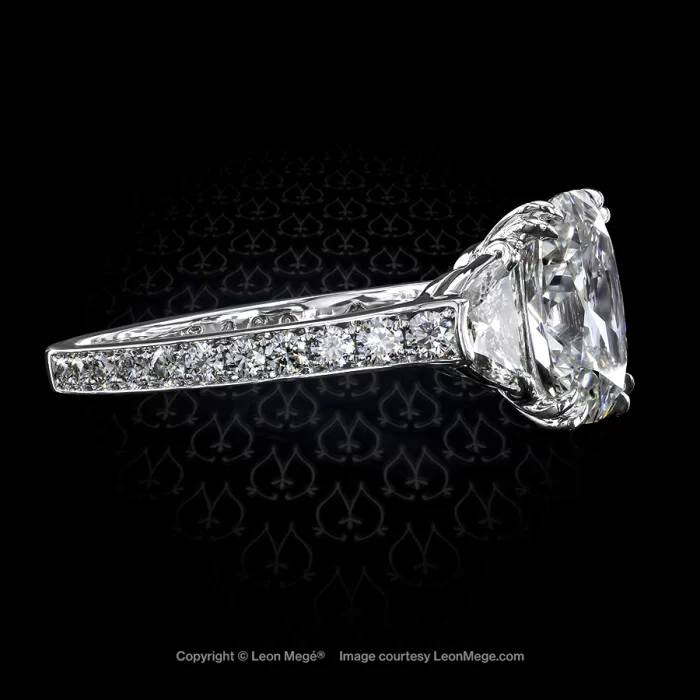 Pave set three-stone ring, featuring 2.08 carat true antique™ cushion diamond by Leon Mege
