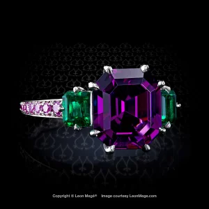 Custom made three-stone ring, featuring 4.53 carat purple garnet by Leon Mege