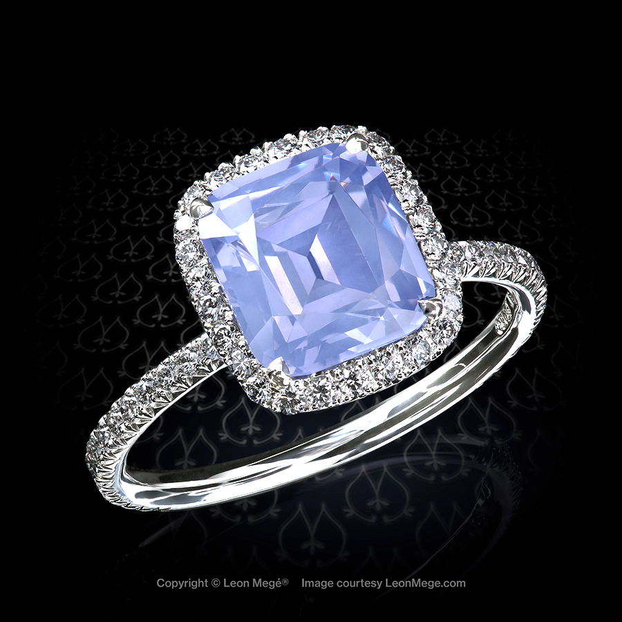 Handmade platinum ring by Leon Mege with certified natural color change cushion cut milky blue Spinel and diamond micro pave halo.