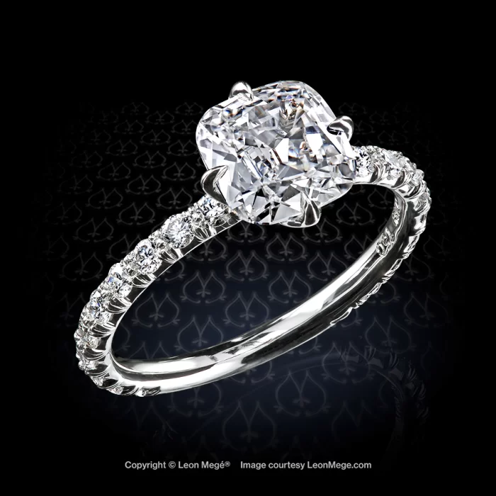 Solitaire Lotus with 1.25 carat set with Leon Mege antique cushion diamond in platinum and 18K rose gold.